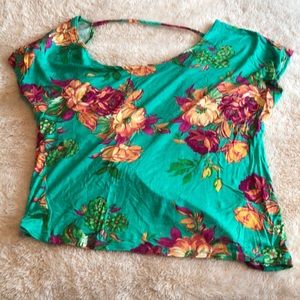 Vibrant floral crop top with open back!